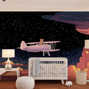 Aviation themed bear pilot wallpaper creating magical atmosphere in toddler's room