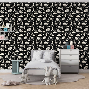 Night sky bears wallpaper with rainbow and moon details in cozy toddler bedroom setting