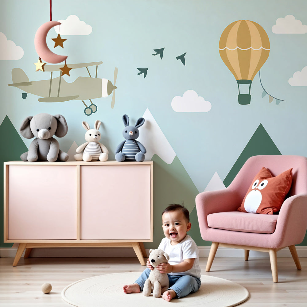 Kids-Mundo hot air balloon and biplane wall mural styled in a bright, airy nursery.