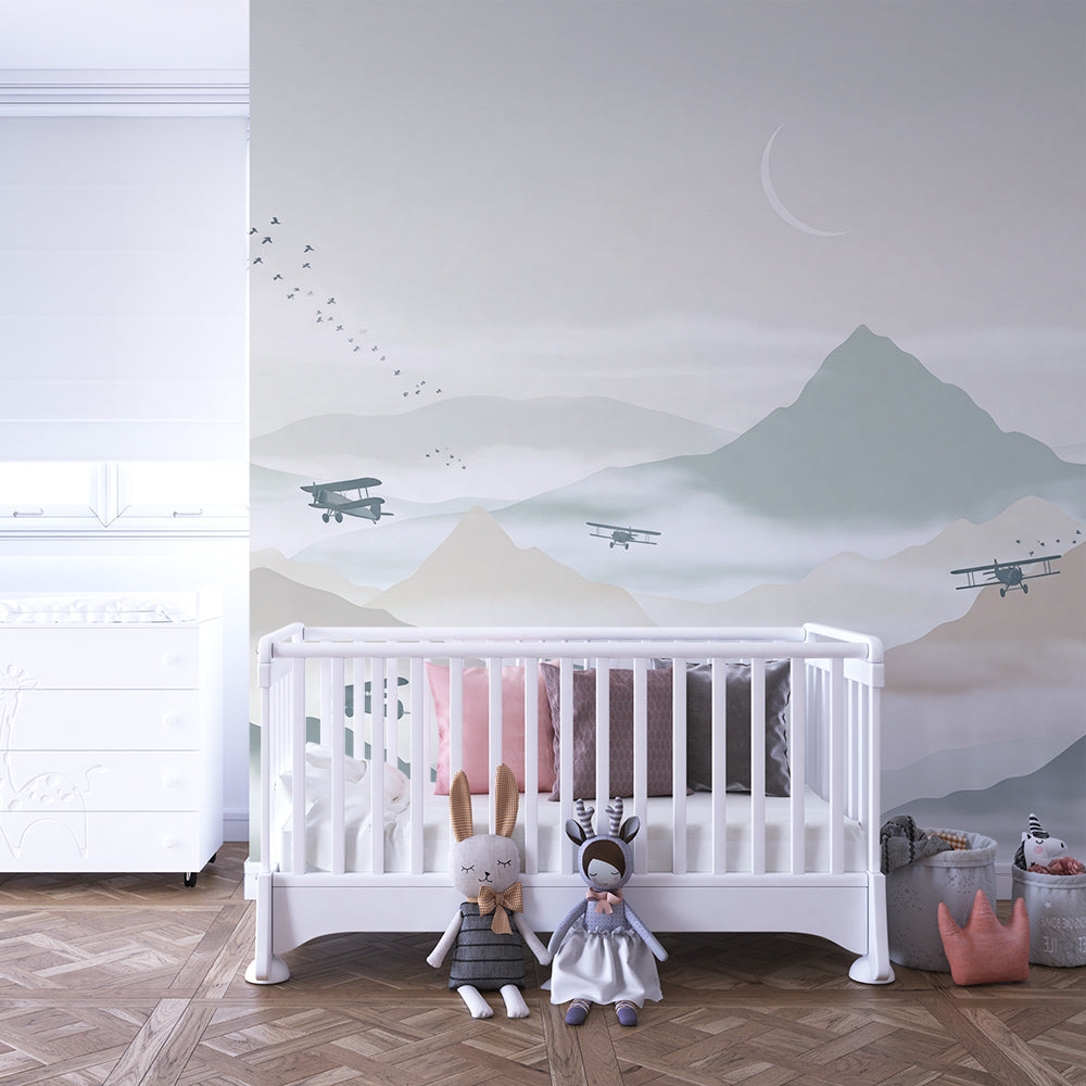 Kids-Mundo biplanes over mountains mural covering a feature wall in a kids' bedroom