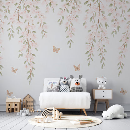 Kids-Mundo watercolour blossom and butterfly wall mural brightening a playful children's playroom wall