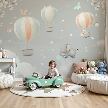 Kids-Mundo elephant hot air balloon wall mural with cherry blossom in a nursery
