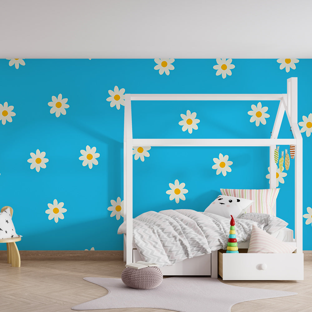 Blue and white daisy wallpaper creating nature-inspired playroom atmosphere by Kids-Mundo