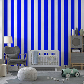 Contemporary blue striped wallpaper transforming children's nursery with bold geometric patterns