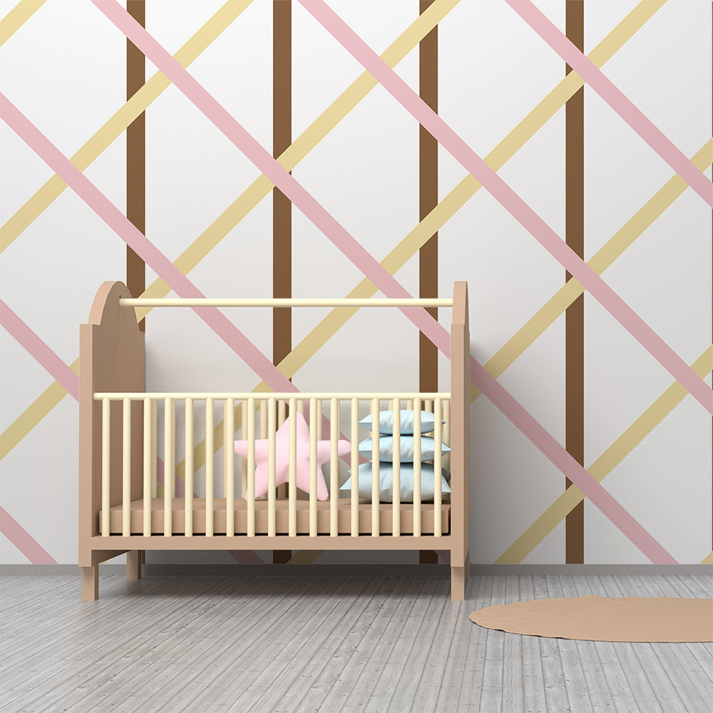 Kids-Mundo pink and cream diamond trellis wall mural behind a bed in a kids bedroom.