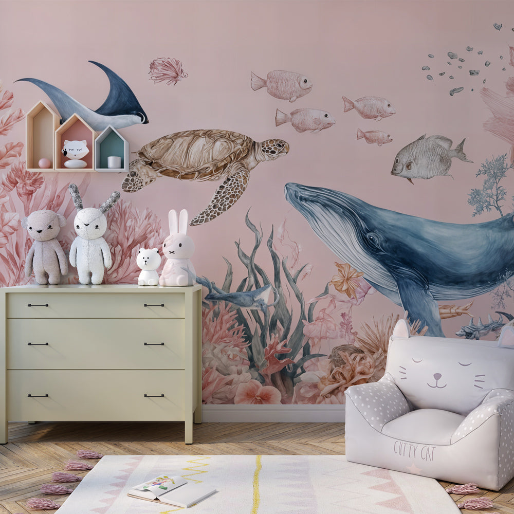 Kids-Mundo pink ocean mural with manta ray and turtle styled in a playroom