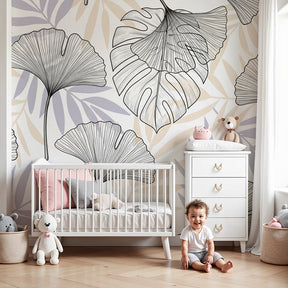 Botanical leaves mural wallpaper in modern nursery with natural wood furniture by Kids-Mundo