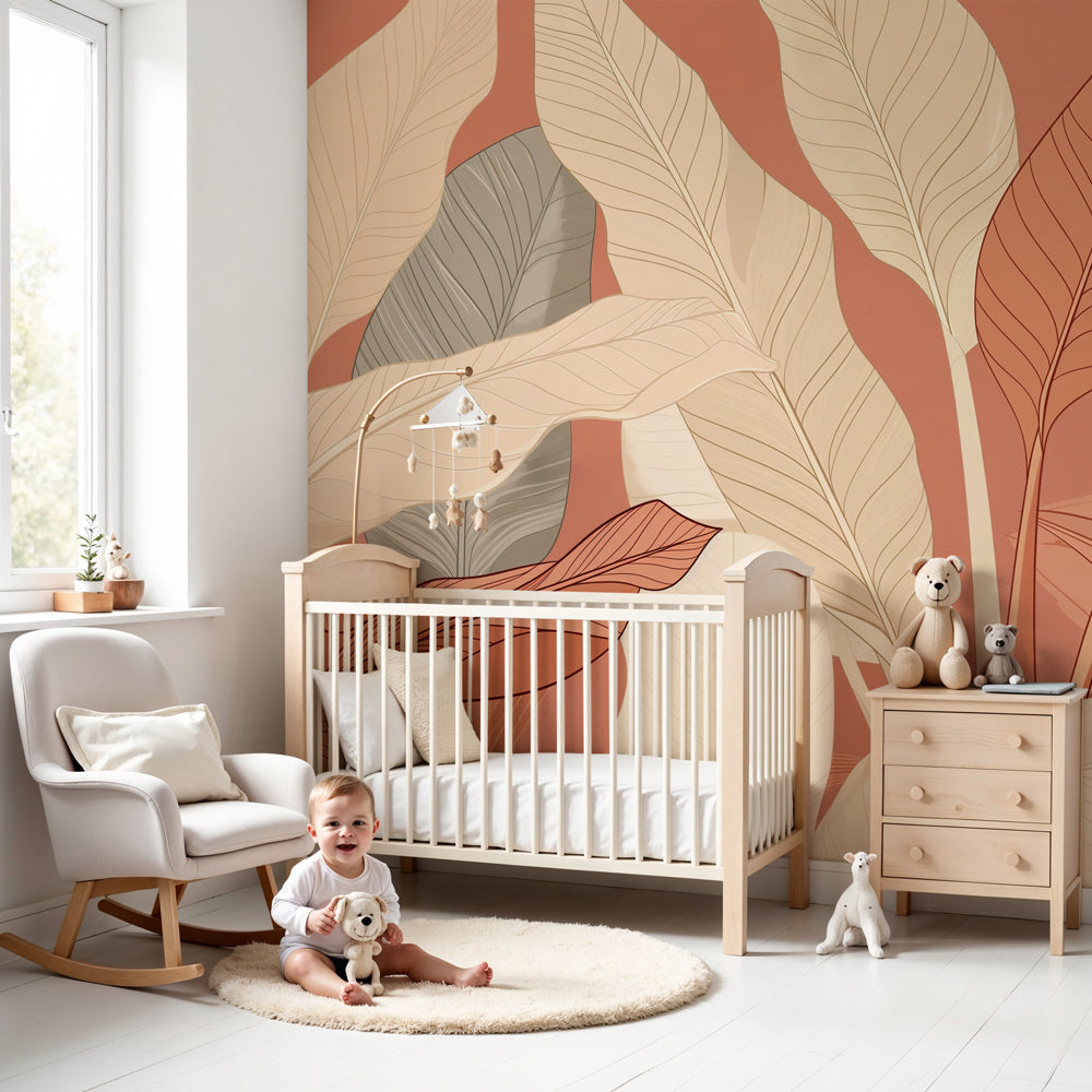 Botanical leaves mural wallpaper creating serene nursery atmosphere with warm beige and terracotta tones by Kids-Mundo