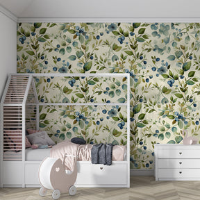 Watercolor botanical wallpaper featuring sage green foliage in peaceful baby room setting
