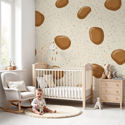 Kids-Mundo brown pebble pattern wall mural styled behind a cot in a warm, natural nursery