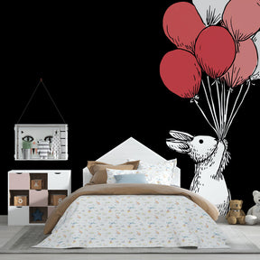 Colorful bunny mural wallpaper creating playful atmosphere in baby bedroom decor