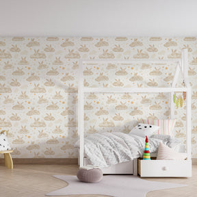 Soft bunny cloud wallpaper transforming toddler room into magical sleep sanctuary