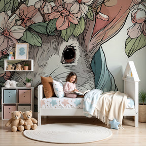 Bunny floral mural wallpaper in cozy nursery with natural wood furniture by Kids-Mundo