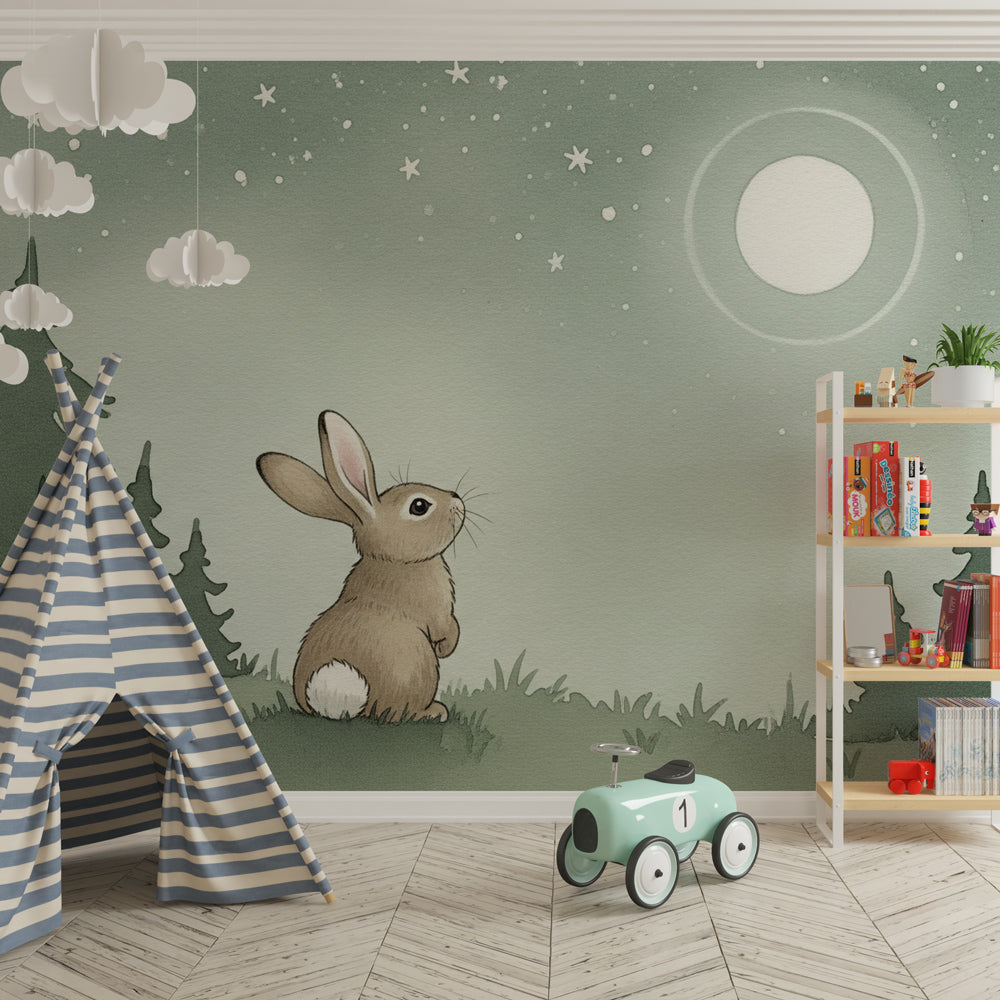 Dreamy bunny and moon wallpaper in modern baby bedroom with soft green and gray tones
