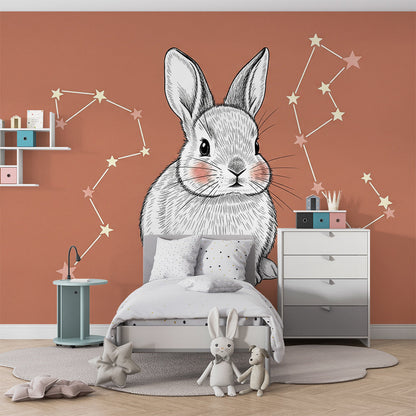 Kids-Mundo bunny constellation mural brightening a terracotta playroom wall