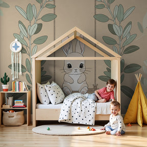 Bunny swing mural wallpaper in peaceful baby nursery with natural wood crib by Kids-Mundo