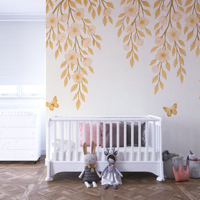 Golden butterfly wallpaper in modern children's room with wooden furniture and soft decor