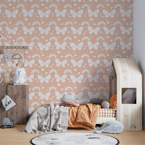 Peach butterfly rainbow mural wallpaper transforming children's playroom into dreamy space