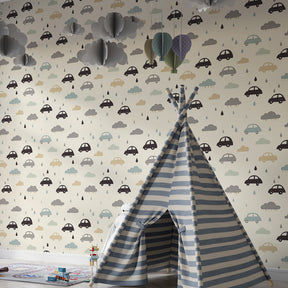 Cars and clouds wallpaper creating playful atmosphere in toddler bedroom decor