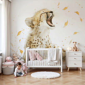 Cheetah cub mural wallpaper with golden leaves in modern nursery room by Kids-Mundo