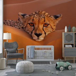Desert cheetah wallpaper transforming kids bedroom with warm orange tones and wildlife theme