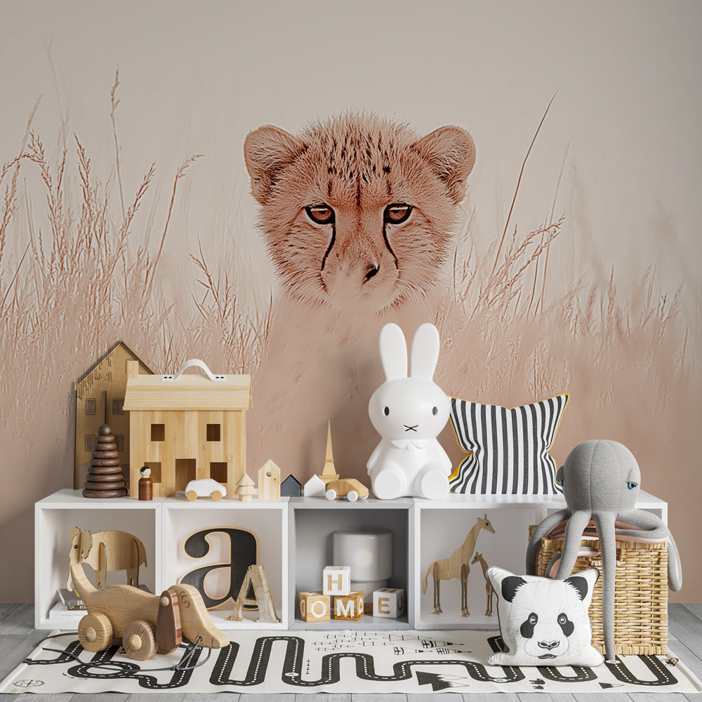Soft beige cheetah mural wallpaper complementing neutral kids room design