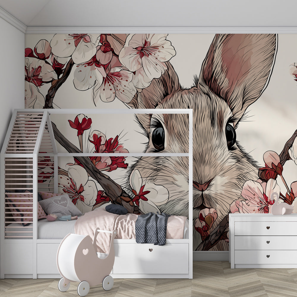 Cherry blossom mural wallpaper creating peaceful nursery atmosphere with bunny design