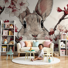 Cherry blossom bunny mural wallpaper in elegant nursery with natural wood crib by Kids-Mundo