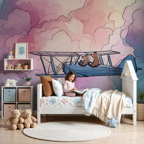 Cloud adventure mural wallpaper with bears flying plane in pastel nursery by Kids-Mundo