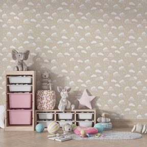 Whimsical cloud and rainbow wallpaper transforming children's bedroom into magical space