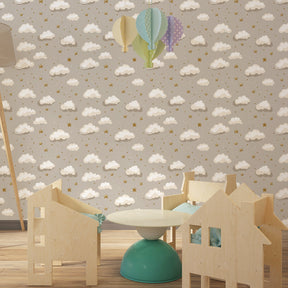 Celestial mural wallpaper featuring soft clouds and stars for calming children's playroom decor