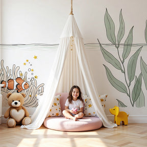 Clownfish coral reef mural wallpaper in modern nursery with ocean themed decor by Kids-Mundo