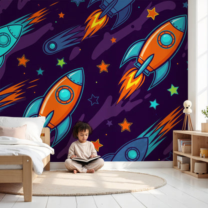 Kids-Mundo colourful rocket and comet wall mural styled behind a cot in a bright, playful nursery