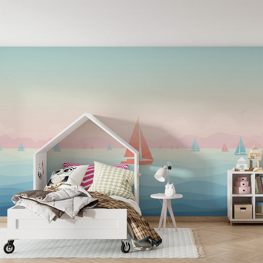 Kids-Mundo sailboat wall mural on a child's bedroom wall, showing colourful boats on a calm sunset sea.