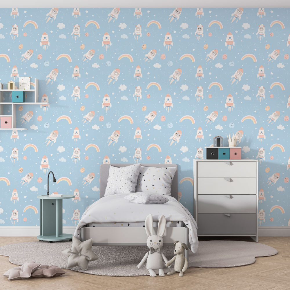 Kids-Mundo astronaut pattern wall mural fitted in a playroom with soft toys and a rug