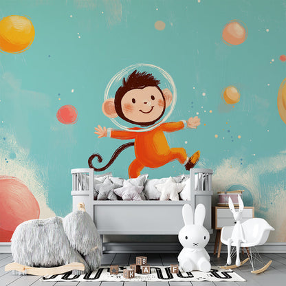 Kids-Mundo colourful monkey astronaut mural filling a playroom wall with planets and stars.