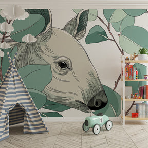 Hidden deer mural wallpaper in children's playroom with natural wood furniture