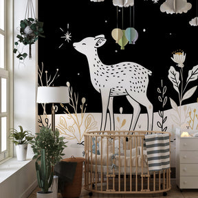 Woodland deer wallpaper transforming baby room with starry night theme