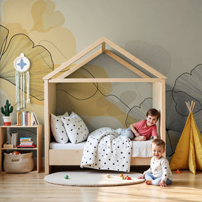Delicate leaves mural wallpaper in soft yellow creating serene nursery atmosphere by Kids-Mundo