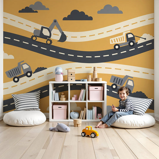 Kids-Mundo digger and dump truck wall mural with winding roads in a bright toddler nursery.