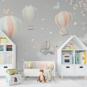 Gentle elephant and cloud wallpaper transforming toddler room into peaceful sanctuary