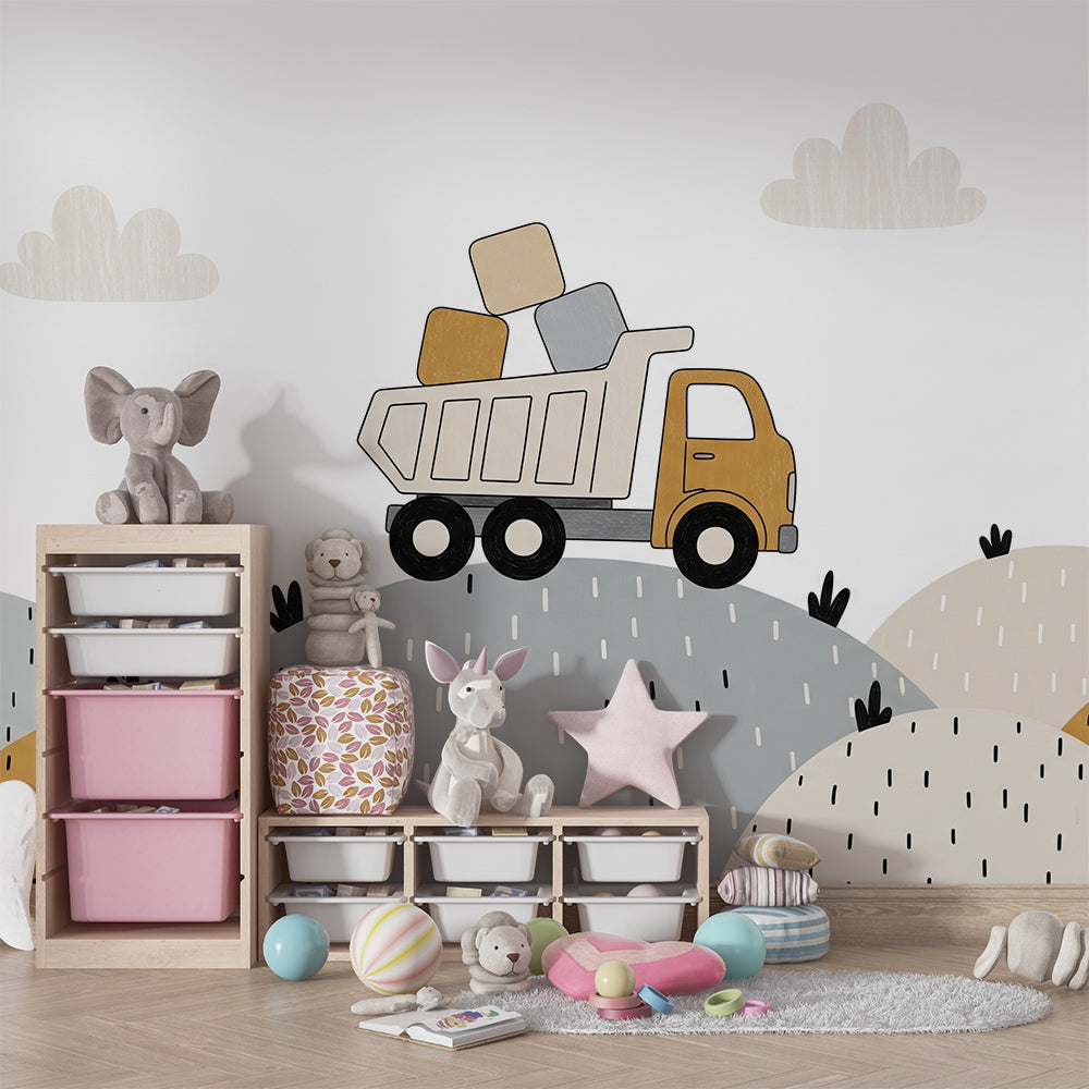 Kids-Mundo dump truck wall mural behind a bed in a cheerful kids bedroom setting.