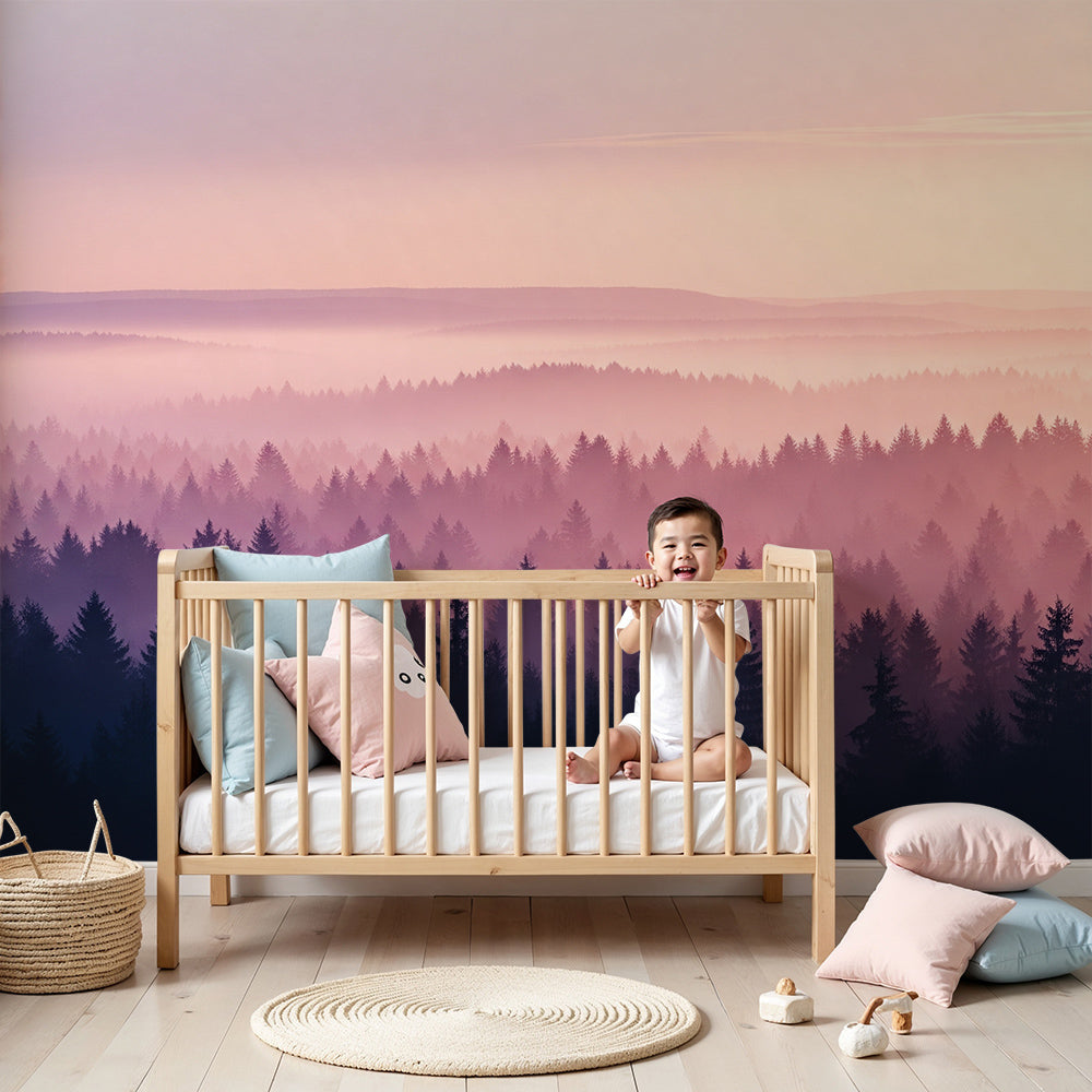 Kids-Mundo dusky pink misty forest wall mural in a calm lilac nursery with a wooden cot