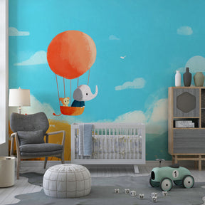 Elephant and bear balloon adventure mural wallpaper in colorful kids playroom setting