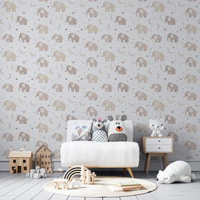 Soft elephant and moon wallpaper transforming modern baby bedroom with neutral tones