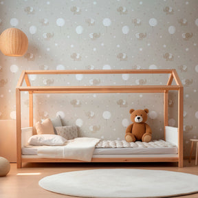 Elephant nursery wallpaper creating peaceful baby room atmosphere with beige tones