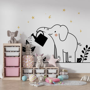 Baby nursery featuring elephant watering plant wallpaper with golden stars and soft lighting