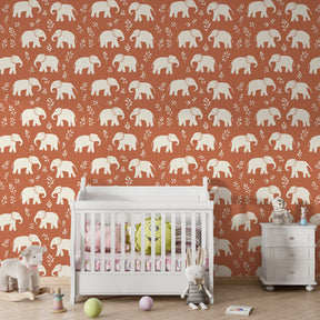 Terracotta elephant mural wallpaper in modern kids room setting with natural decor elements