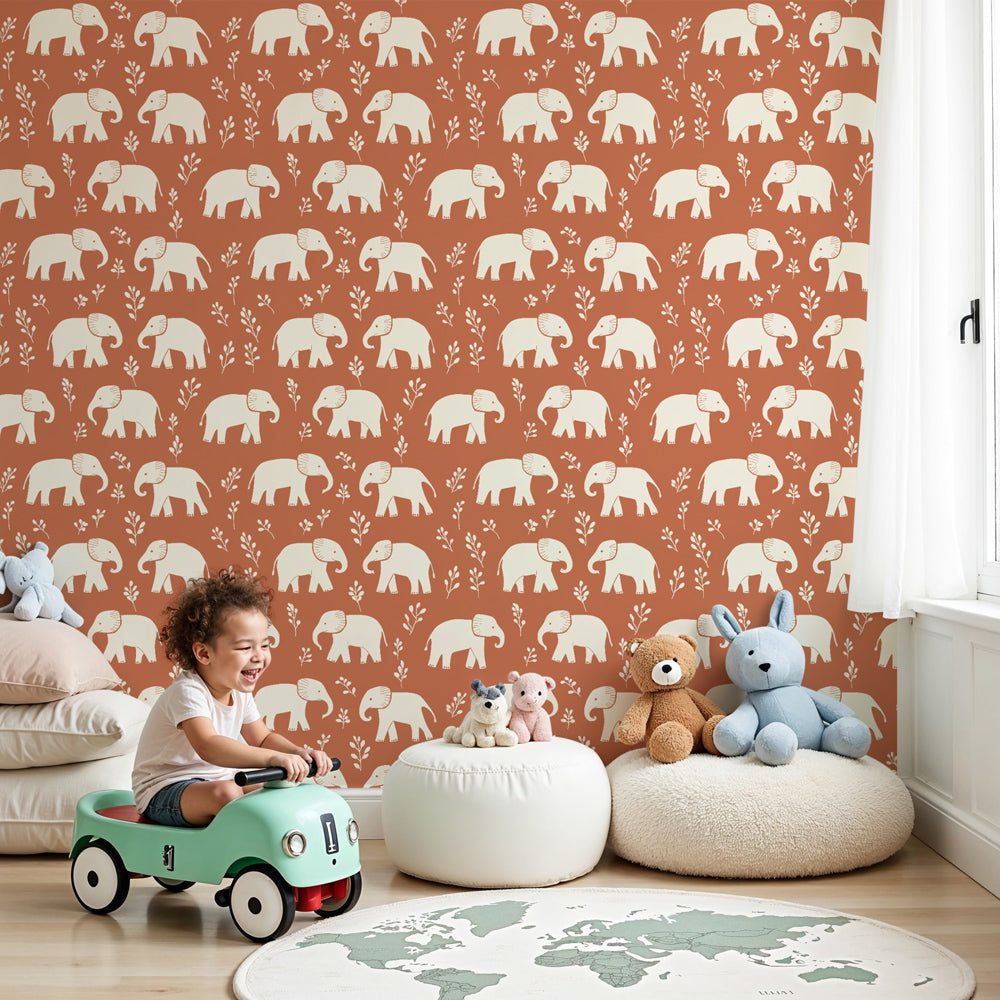 Elephant mural wallpaper creating warm safari-themed nursery decor with terracotta background by Kids-Mundo