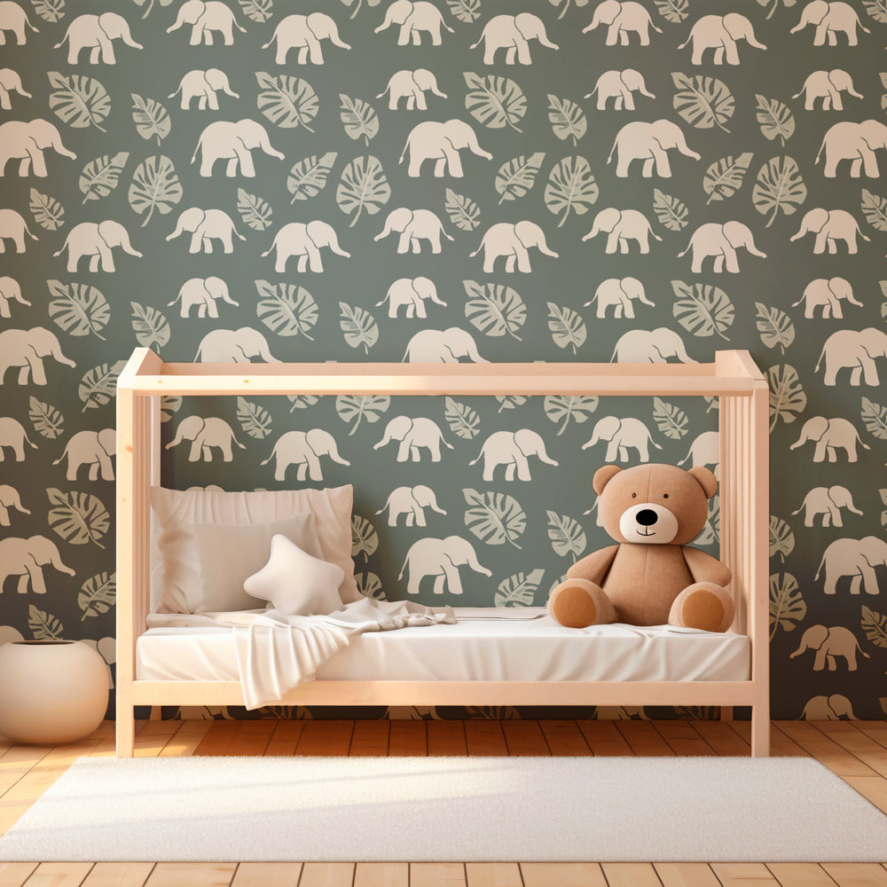 Green jungle elephant wallpaper creating calming atmosphere in kids playroom by Kids-Mundo